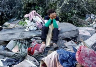 a palestinian boy reacts as he sits at the site of an overnight israeli strike on a house in nuseirat central gaza strip october 29 2025 photo reuters