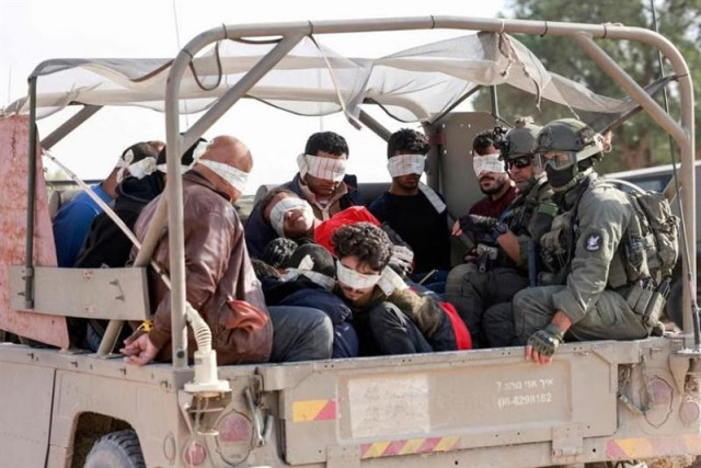 israeli soldiers transfer detained palestinians out of the gaza strip afp israeli soldiers transfer detained palestinians out of the gaza strip afp