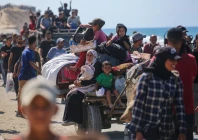 palestinians make their way along al rashid road toward gaza city from nuseirat in the central gaza strip on october 10 2025 photo afp palestinians make their way along al rashid road toward gaza city from nuseirat in the central gaza strip on october 10 2025 photo afp