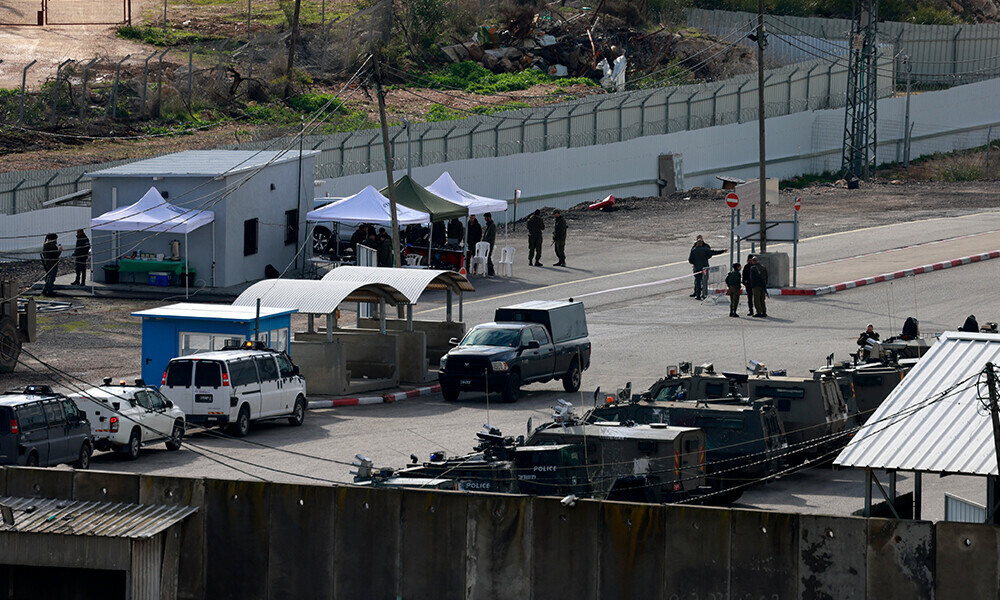 israeli troops gather with their vehicles inside the ofer military prison complex located between ramallah and beitunia in the occupied west bank before releasing palestinian prisoners as part of a hostage prisoner exchange on february 8 2025 photo afp