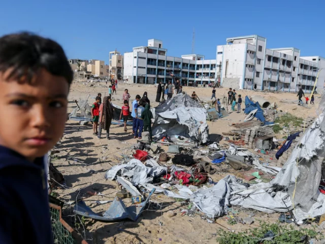 palestinians inspect the site of an israeli strike on a tent housing displaced people in khan younis in the southern gaza strip march 19 photo reuters palestinians inspect the site of an israeli strike on a tent housing displaced people in khan younis in the southern gaza strip march 19 photo reuters