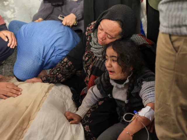 mourners react next to the bodies of palestinians killed in israeli strikes at al ahli arab baptist hospital in gaza city march 24 2025 photo reuters mourners react next to the bodies of palestinians killed in israeli strikes at al ahli arab baptist hospital in gaza city march 24 2025 photo reuters