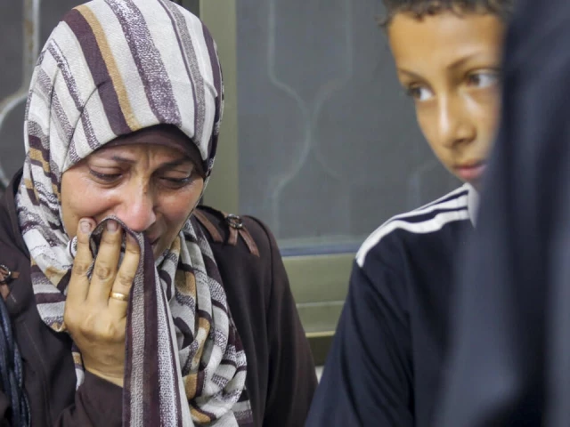 mourned at the morgue of a central gaza hospital where victims of a shooting incident near an aid centre were taken photo afp mourned at the morgue of a central gaza hospital where victims of a shooting incident near an aid centre were taken photo afp