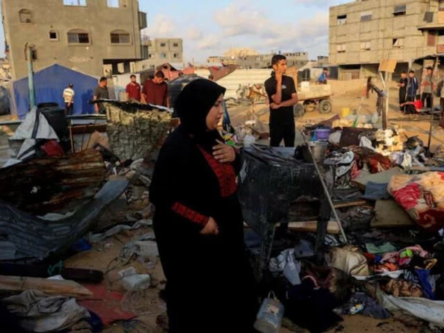 palestinians inspect the damage at the site of an overnight israeli air strike on a tent sheltering displaced people in khan yunis southern gaza july 2 2025 reuters palestinians inspect the damage at the site of an overnight israeli air strike on a tent sheltering displaced people in khan yunis southern gaza july 2 2025 reuters