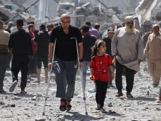 palestinians inspect the debris after israeli bombardment at al daraj neighbourhood in gaza city on april 22 2024 amid ongoing battles between israel and the palestinian hamas movement photo afp