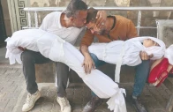 a palestinian man is comforted by a relative as he mourns over the bodies of his children who were killed in overnight israeli strikes at the al shifa hospital in gaza city photo afp a palestinian man is comforted by a relative as he mourns over the bodies of his children who were killed in overnight israeli strikes at the al shifa hospital in gaza city photo afp