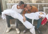 a palestinian man is comforted by a relative as he mourns over the bodies of his children who were killed in overnight israeli strikes at the al shifa hospital in gaza city photo afp a palestinian man is comforted by a relative as he mourns over the bodies of his children who were killed in overnight israeli strikes at the al shifa hospital in gaza city photo afp