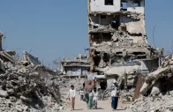 palestinians walk past the rubble of residential buildings destroyed during the war at jabalia refugee camp in the northern gaza strip august 5 2026 reuters