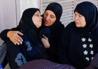 mother of three year old palestinian child tayyem hamdan who was killed in an israeli strike according to medics at al aqsa martyrs hospital in deir al balah reacts during his funeral in central gaza strip august 30 2026 reuters