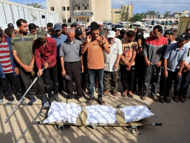 mourners pray during the funeral of a palestinian killed in what the gaza health ministry says was israeli fire near a distribution center in rafah at nasser hospital in khan younis in the southern gaza strip june 15 2025 photo reuters mourners pray during the funeral of a palestinian killed in what the gaza health ministry says was israeli fire near a distribution center in rafah at nasser hospital in khan younis in the southern gaza strip june 15 2025 photo reuters