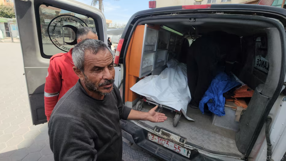 a mourner reacts next to the bodies of palestinians killed in an israeli strike according to medics at al aqsa martyrs hospital in deir al balah in the central gaza strip march 17 2025 photo reuters