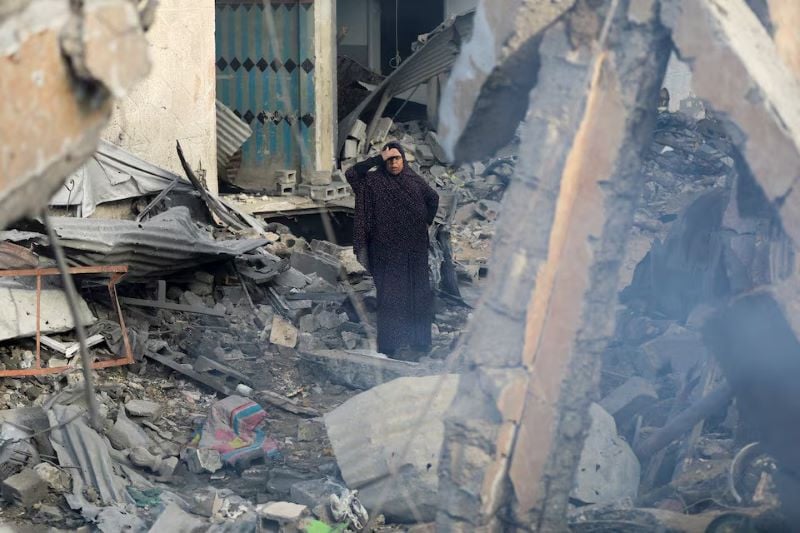 a palestinian woman reacts at the site of an israeli strike on a house amid the ongoing conflict between israel and hamas in gaza city january 4 2025 photo reuters