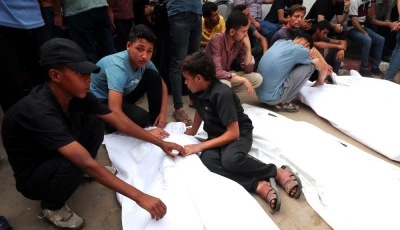 mourners react next to the bodies of palestinians killed in israeli strikes on monday according to gaza s health ministry during their funeral at al shifa hospital in gaza city july 1 2025 photo reuters