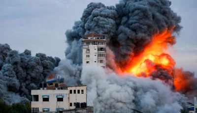 smoke and flames billow after israeli forces struck a high rise tower in gaza city october 7 photo reuters