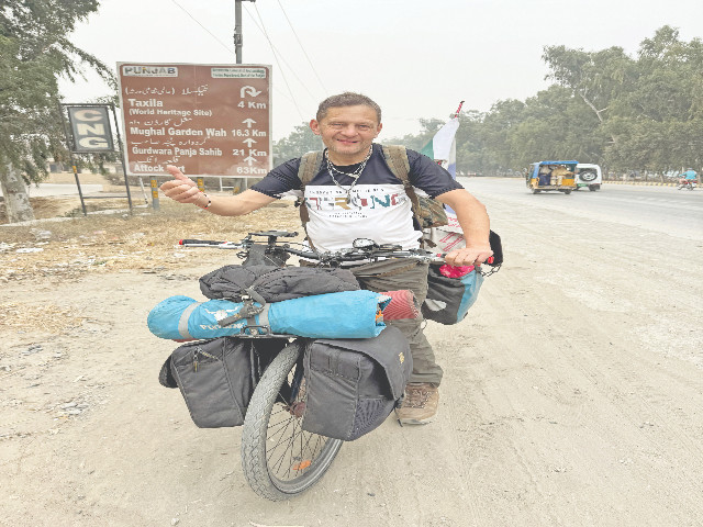 german adventure seeker frank zak travels with a specially equipped bicycle that carries everything he needs camping gear cooking essentials and other necessities essentially making his bike his mobile home photos express