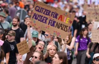 people hold a sign that reads glitter for everyone except for nazis during a protest against a two day party convention of germany s far right alternative for germany afd party in erfurt germany july 4 2026 reuters people hold a sign that reads glitter for everyone except for nazis during a protest against a two day party convention of germany s far right alternative for germany afd party in erfurt germany july 4 2026 reuters
