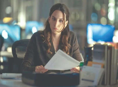 genesis rodriguez dissects the night agent s isabel