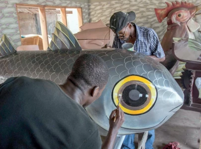 in ghana fantasy coffins tell stories of the dead