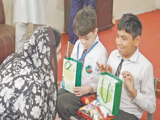 special assistant to cm sania ashiq presents eid gifts to children at a special education centre photo express