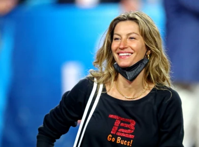 gisele b ndchen hits the water in surfside amid parenting break