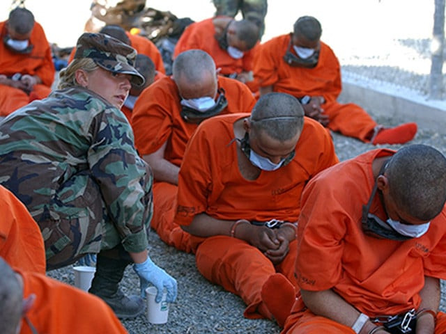 detainees on arrival to camp x ray the holding facility at guant namo bay cuba photo us dod detainees on arrival to camp x ray the holding facility at guant namo bay cuba photo us dod