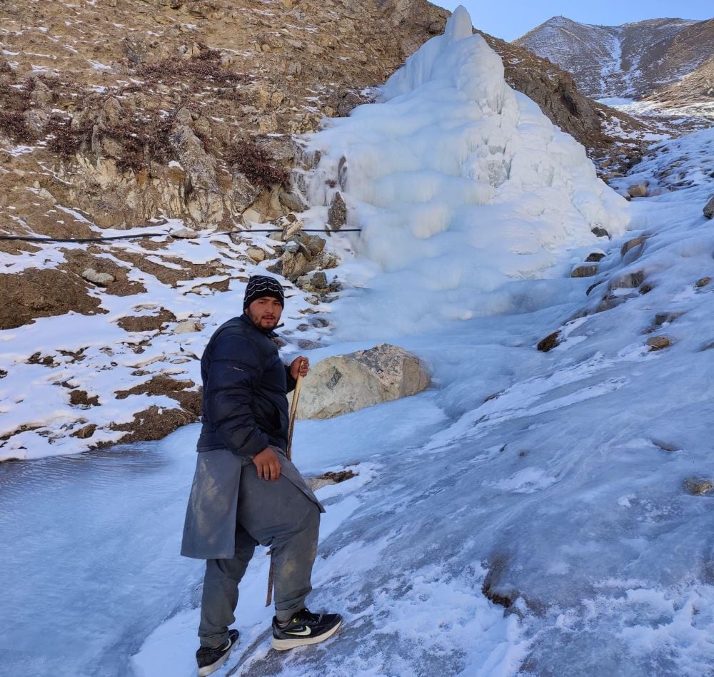 A volunteer from Ghanche district of Gilgit-Baltistan working to revive an artificial glacier. PHOTO: UNICEF PAKISTAN