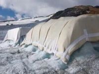 a sheep wool covered snow protection test site is pictured during a press conference presenting the results of the keep it wool glacier protection experiment in les diablerets switzerland september 2 2026 the project tested wool coverings on the tsanfleuron glacier at glacier 3000 as a biodegradable alternative to synthetic geotextiles used in snow farming to help slow glacier melt photo reuters