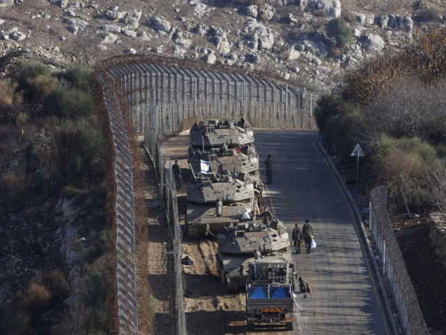 israeli tanks take position on border with syria near the druze village of majdal shams in the israel annexed golan heights on december 8 2024 photo afp israeli tanks take position on border with syria near the druze village of majdal shams in the israel annexed golan heights on december 8 2024 photo afp