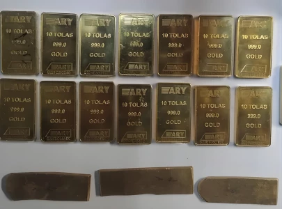 asf seizes over 2kg gold from dubai bound passenger at lahore airport