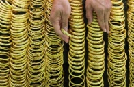 a seller arranges gold bracelets at a jewelry shop in bangkok s chinatown thailand photo reuters file a seller arranges gold bracelets at a jewelry shop in bangkok s chinatown thailand photo reuters file