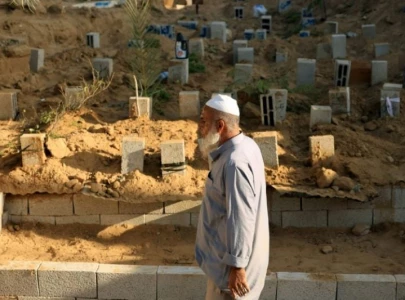 overwhelmed gaza undertakers forced to stack graves on top of graves overwhelmed gaza undertakers forced to stack graves on top of graves