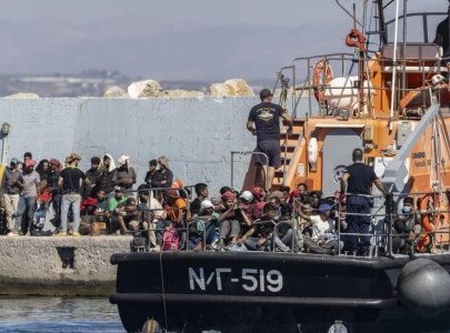 greece draws criticism over tougher asylum stance