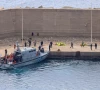 a greek coast guard vessel transfers activists of the global sumud flotilla which was intercepted on international waters by the israeli navy at the port of atherinolakkos on the island of crete greece may 1 2026 photo reuters
