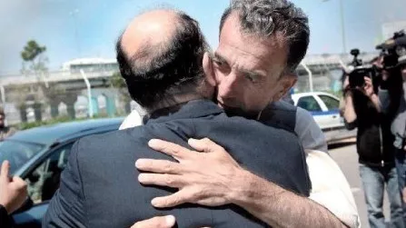 greek volunteer freed by taliban reaches athens greek volunteer freed by taliban reaches athens