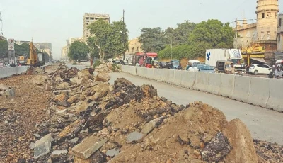 ma jinnah road lies torn open outside the historic former radio pakistan building its dust and trenches marking the slow beating pulse of a city remaking itself photo express