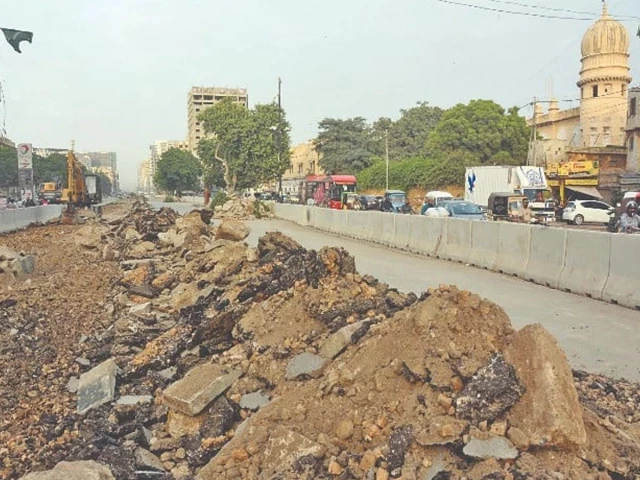 ma jinnah road lies torn open outside the historic former radio pakistan building its dust and trenches marking the slow beating pulse of a city remaking itself photo express