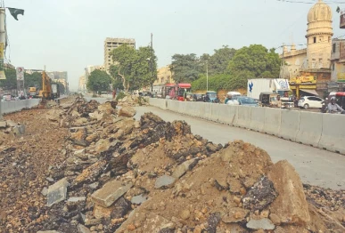 ma jinnah road lies torn open outside the historic former radio pakistan building its dust and trenches marking the slow beating pulse of a city remaking itself photo express