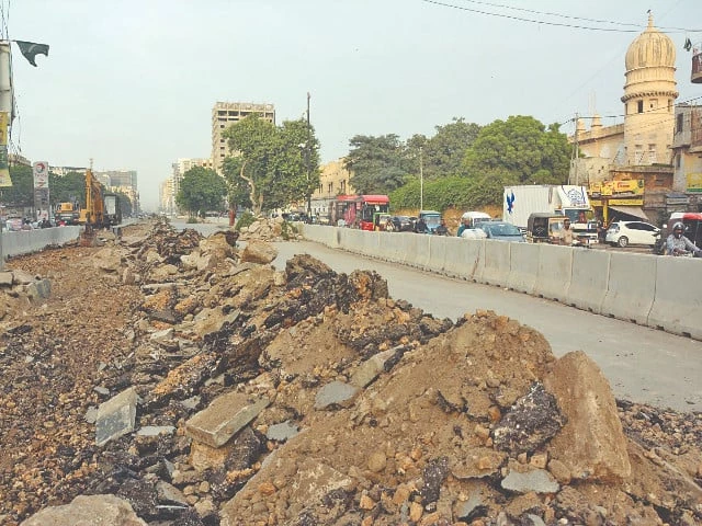 ma jinnah road lies torn open outside the historic former radio pakistan building its dust and trenches marking the slow beating pulse of a city remaking itself photo express ma jinnah road lies torn open outside the historic former radio pakistan building its dust and trenches marking the slow beating pulse of a city remaking itself photo express