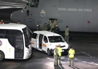 a royal danish air force plane carrying personnel in military fatigues lands at nuuk airport greenland january 14 2026 photo reuters