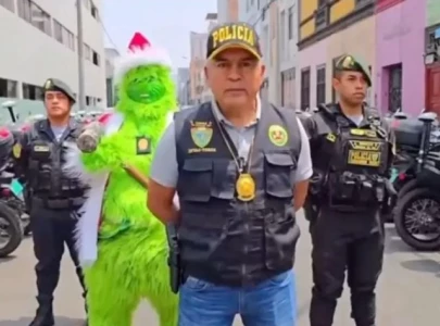 police officer dressed as grinch steals christmas with creative drug bust in lima police officer dressed as grinch steals christmas with creative drug bust in lima