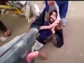 pointing the gun at the thieves the woman shouted at them as they plead for forgiveness screengrab