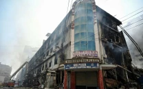 rising smoke locked exits how karachi mall inferno trapped victims