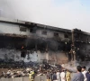 a view of the damaged gul plaza market building after a fire in karachi photo x