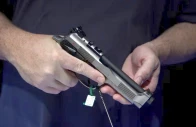 an attendee holds a handgun on display at the national rifle association nra annual convention in houston texas u s may 29 2022 reuters