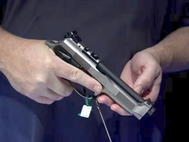an attendee holds a handgun on display at the national rifle association nra annual convention in houston texas u s may 29 2022 reuters an attendee holds a handgun on display at the national rifle association nra annual convention in houston texas u s may 29 2022 reuters