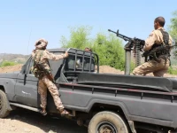 members of the saudi backed yemeni government forces ride on a military pick up vehicle as they patrol a road leading to a frontline of clashes with iran aligned houthi fighters in taiz province yemen september 30 2026 reuters