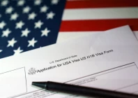 a us flag and a us h 1b visa application form are seen in this illustration taken september 22 2025 photo reuters