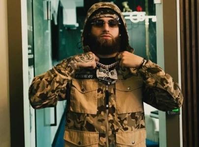 puerto rican reggaeton artist hades66 bloodied after glass shatters across face in shocking onstage attack