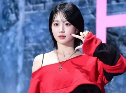 nmixx s haewon to perform sitting down after sustaining minor back injury