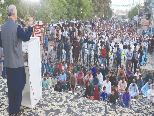 ji ameer hafiz naeeur rahman address the iftar gathering in landhi on saturday photo express